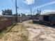 View of the backyard surrounded by wooden and concrete fencing at 2642 San Vincente Ct, Las Vegas, NV 89115