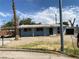 Modest single-story home featuring a light blue exterior, covered porch, and desert landscaping at 2642 San Vincente Ct, Las Vegas, NV 89115
