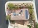 Aerial view of a home featuring solar panels and nicely landscaped surroundings at 2691 Benton Cove St, Laughlin, NV 89029