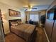 Comfortable bedroom with a desk, a bed and neutral colors at 2691 Benton Cove St, Laughlin, NV 89029