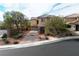 Charming two-story home with landscaped yard and a welcoming entrance at 2691 Benton Cove St, Laughlin, NV 89029