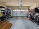 Spacious garage with ample storage shelving and a well-lit environment at 2691 Benton Cove St, Laughlin, NV 89029