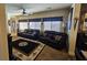 Cozy living room with plush sofas, natural light, and stylish area rug at 2691 Benton Cove St, Laughlin, NV 89029