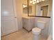 Bathroom with vanity, mirror, and tile flooring at 270 E Flamingo Rd # 107, Las Vegas, NV 89169