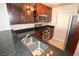 Beautiful kitchen featuring stone countertops, stainless steel appliances, and wood cabinets at 270 E Flamingo Rd # 107, Las Vegas, NV 89169