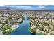 Picturesque aerial view of a lakeside community with tropical landscaping and waterways at 3150 Soft Breezes Dr # 1040, Las Vegas, NV 89128