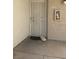 Exterior condo entrance with security gate and stucco siding at 3150 Soft Breezes Dr # 1040, Las Vegas, NV 89128