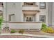 Condo patio featuring stucco siding, exterior storage, and desert landscaping at 3150 Soft Breezes Dr # 1040, Las Vegas, NV 89128