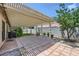 Backyard patio features a large covered area, perfect for outdoor entertaining at 3220 W Hammer Ln, North Las Vegas, NV 89031