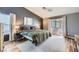 Main bedroom with vaulted ceilings, sliding door to patio with spa, carpet and natural light at 3220 W Hammer Ln, North Las Vegas, NV 89031