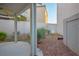 Backyard space with a covered patio, low-maintenance desert landscaping, and privacy walls at 3331 Cheltenham St, Las Vegas, NV 89129