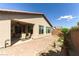 Charming backyard features a covered patio, brick landscaping, and desert plants at 3621 Jasmine Heights Ave, North Las Vegas, NV 89081