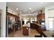 Bright kitchen with stainless steel appliances, granite countertops, and island for meal prep at 3621 Jasmine Heights Ave, North Las Vegas, NV 89081