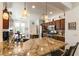 Beautiful kitchen with granite countertops, a central island, and stainless steel appliances at 3621 Jasmine Heights Ave, North Las Vegas, NV 89081
