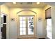 Arched entry to the office, with glass doors providing views of the interior at 3621 Jasmine Heights Ave, North Las Vegas, NV 89081
