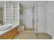 Modern bathroom with glass shower, stone bench, and unique shelving at 3726 Las Vegas Blvd # 1809, Las Vegas, NV 89158