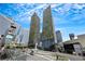 View of modern high-rise buildings in the city with a vibrant sky, showcasing luxury and location at 3726 Las Vegas Blvd # 1809, Las Vegas, NV 89158