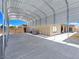 Spacious covered carport providing ample parking and featuring a neutral exterior palette at 3780 Shawnee Ave, Pahrump, NV 89048