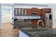 Kitchen featuring stone countertops and stainless-steel appliances at 3780 Shawnee Ave, Pahrump, NV 89048
