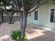 Paver patio with shade trees lining the house at 4113 Arcola Ave, Las Vegas, NV 89110