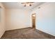 This bedroom has carpet flooring and a closet for ample storage at 4611 Four Leaf Clover Dr, Las Vegas, NV 89122