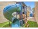 Backyard playhouse complete with a slide and ladder at 4611 Four Leaf Clover Dr, Las Vegas, NV 89122