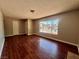 Open living room featuring wood-look flooring, recessed lighting, and natural light at 4766 Knollwood Dr, Las Vegas, NV 89147