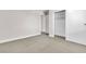 Neutral bedroom featuring a closet with sliding doors and views of other rooms at 4813 Plata Del Sol, Las Vegas, NV 89121