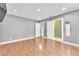 Spacious bedroom with multiple closets and laminate wood flooring at 5012 Newport Cove Dr # C, Las Vegas, NV 89119