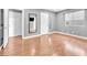 Bedroom with multiple doors and closets and laminate wood flooring at 5012 Newport Cove Dr # C, Las Vegas, NV 89119