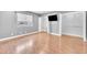 Bedroom with laminate wood flooring, a window, and large closet at 5012 Newport Cove Dr # C, Las Vegas, NV 89119