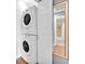 A stackable washer and dryer unit is conveniently located in a mirror-accented room at 5012 Newport Cove Dr # C, Las Vegas, NV 89119