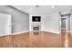 Spacious living room features neutral colors and a fireplace at 5012 Newport Cove Dr # C, Las Vegas, NV 89119