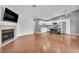 Open concept living area features fireplace and eat-in kitchen with a functional island at 5012 Newport Cove Dr # C, Las Vegas, NV 89119