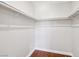 Walk-in closet with laminate flooring and white shelving at 5063 Eldora Ave # 4, Las Vegas, NV 89146
