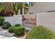 Park West Condominiums sign with decorative landscaping and stucco wall at 5063 Eldora Ave # 4, Las Vegas, NV 89146