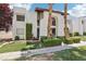 Inviting two-story condo with well-maintained landscaping and desert-friendly design at 5063 Eldora Ave # 4, Las Vegas, NV 89146
