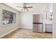 An eat-in kitchen featuring modern stainless steel appliances and a ceiling fan at 5063 Eldora Ave # 4, Las Vegas, NV 89146