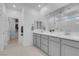 Modern bathroom with double vanity, walk-in shower, and stylish fixtures, creating a luxurious and functional space at 5357 Eleganza Ave, Pahrump, NV 89061