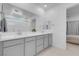 Bright bathroom featuring a double sink vanity with white countertop at 5357 Eleganza Ave, Pahrump, NV 89061