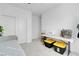 Bright bedroom featuring a daybed, sewing machine, and craft supplies at 5357 Eleganza Ave, Pahrump, NV 89061
