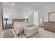 Cozy bedroom with neutral tones, plush carpeting, and a comfortable bed, offering a serene retreat at 5357 Eleganza Ave, Pahrump, NV 89061