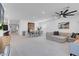 Open-concept living and dining area with ample space, modern decor, and a seamless flow, perfect for entertaining at 5357 Eleganza Ave, Pahrump, NV 89061