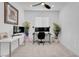 Modern office area with neutral tones and ceiling fan at 5357 Eleganza Ave, Pahrump, NV 89061