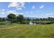 Scenic view of grassy area and pond at 5357 Eleganza Ave, Pahrump, NV 89061