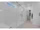 Bright white walk-in shower with glass enclosure and white subway tile surround at 5357 Eleganza Ave, Pahrump, NV 89061
