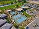 Aerial view of the community tennis courts, and other green spaces at 5357 Eleganza Ave, Pahrump, NV 89061