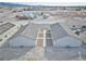 Overhead shot of desert homes with minimalistic landscaping and close community proximity at 610 San Lorenzo St, Pahrump, NV 89048