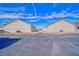 Two single-story homes, each showcasing identical exterior design with low-maintenance landscaping and ample parking space at 610 San Lorenzo St, Pahrump, NV 89048