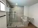 Bathroom featuring a glass shower, modern fixtures, and a pebble floor at 6191 Bullion Blvd, Las Vegas, NV 89103